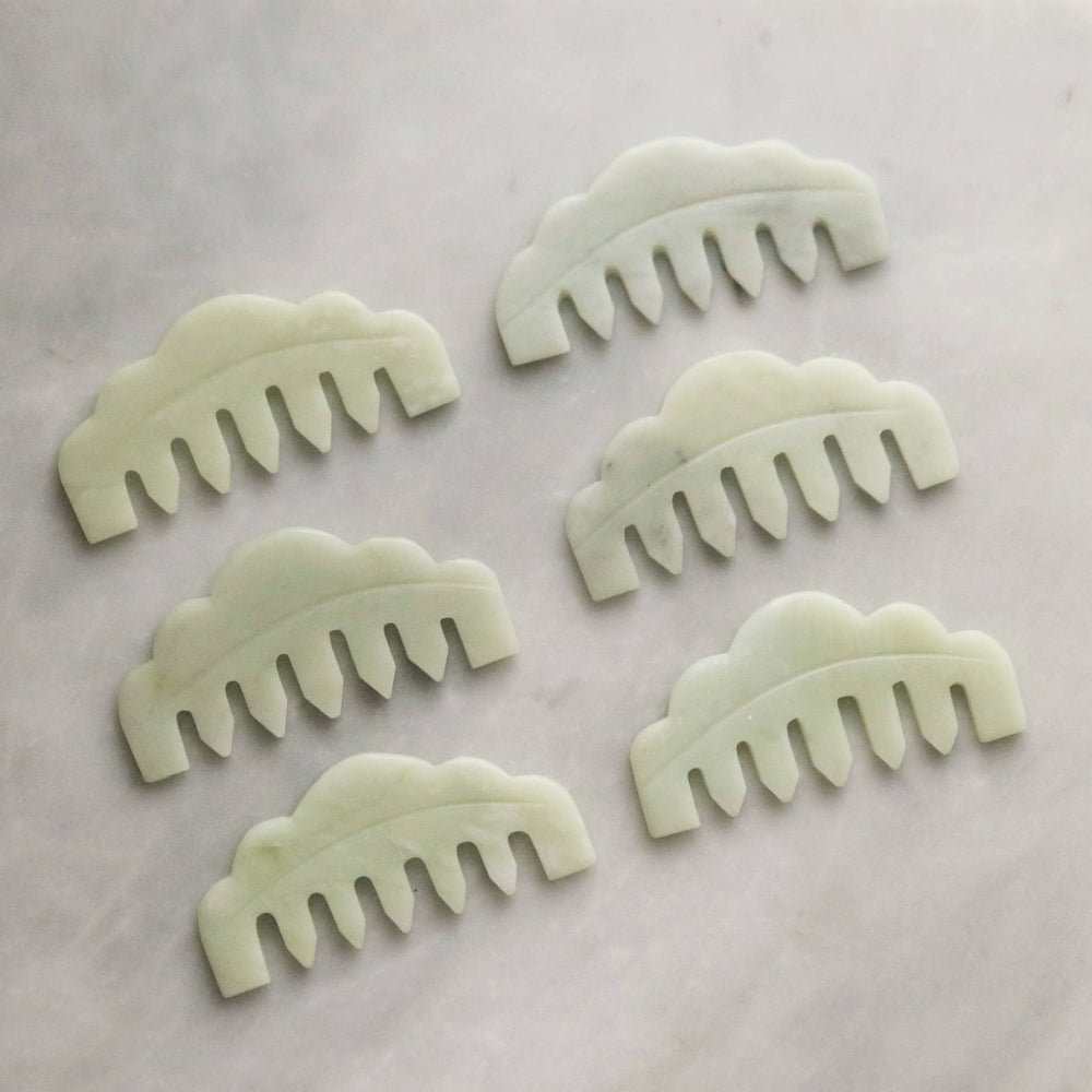 
                  
                    Load image into Gallery viewer, The Jade Massaging Gua Sha Comb
                  
                